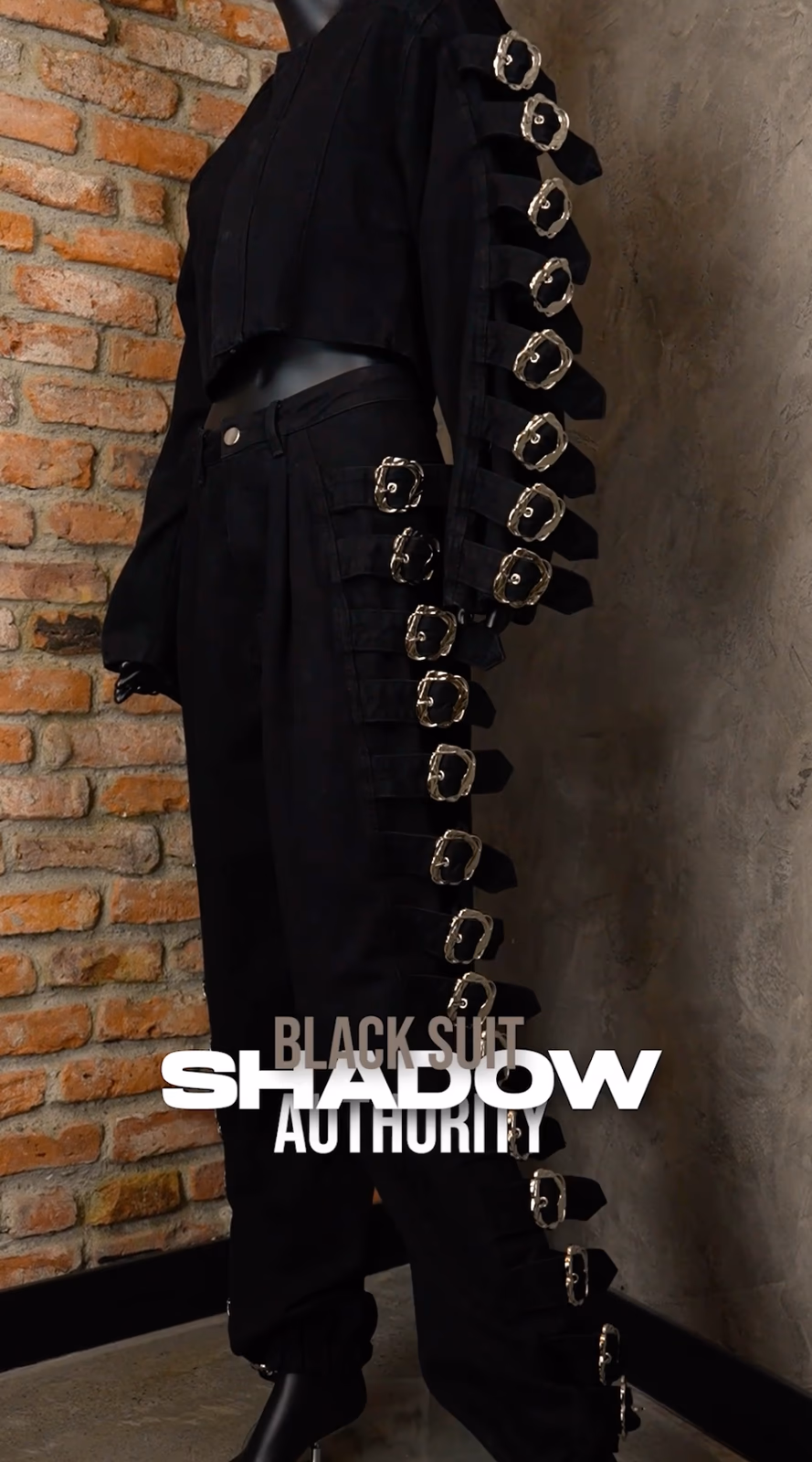 ALLDENIMS Shadow black suit — cropped jacket and trousers with silver buckle straps
