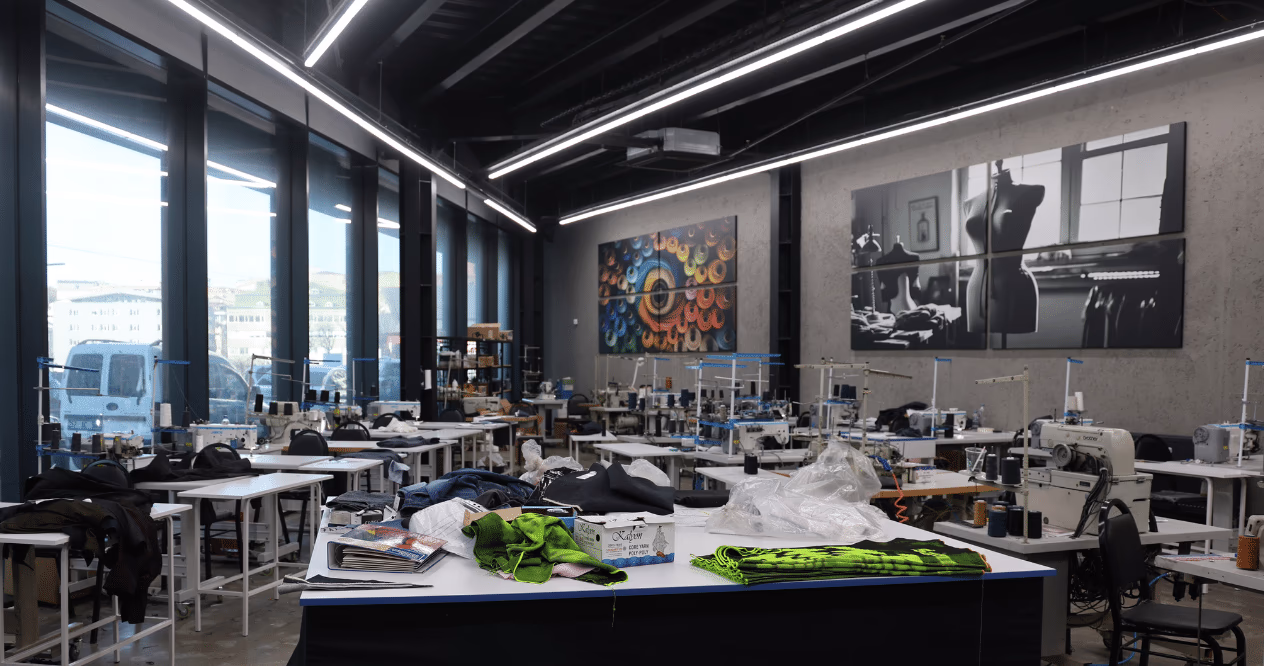 ALLDENIMS sewing workshop — industrial machines and production floor